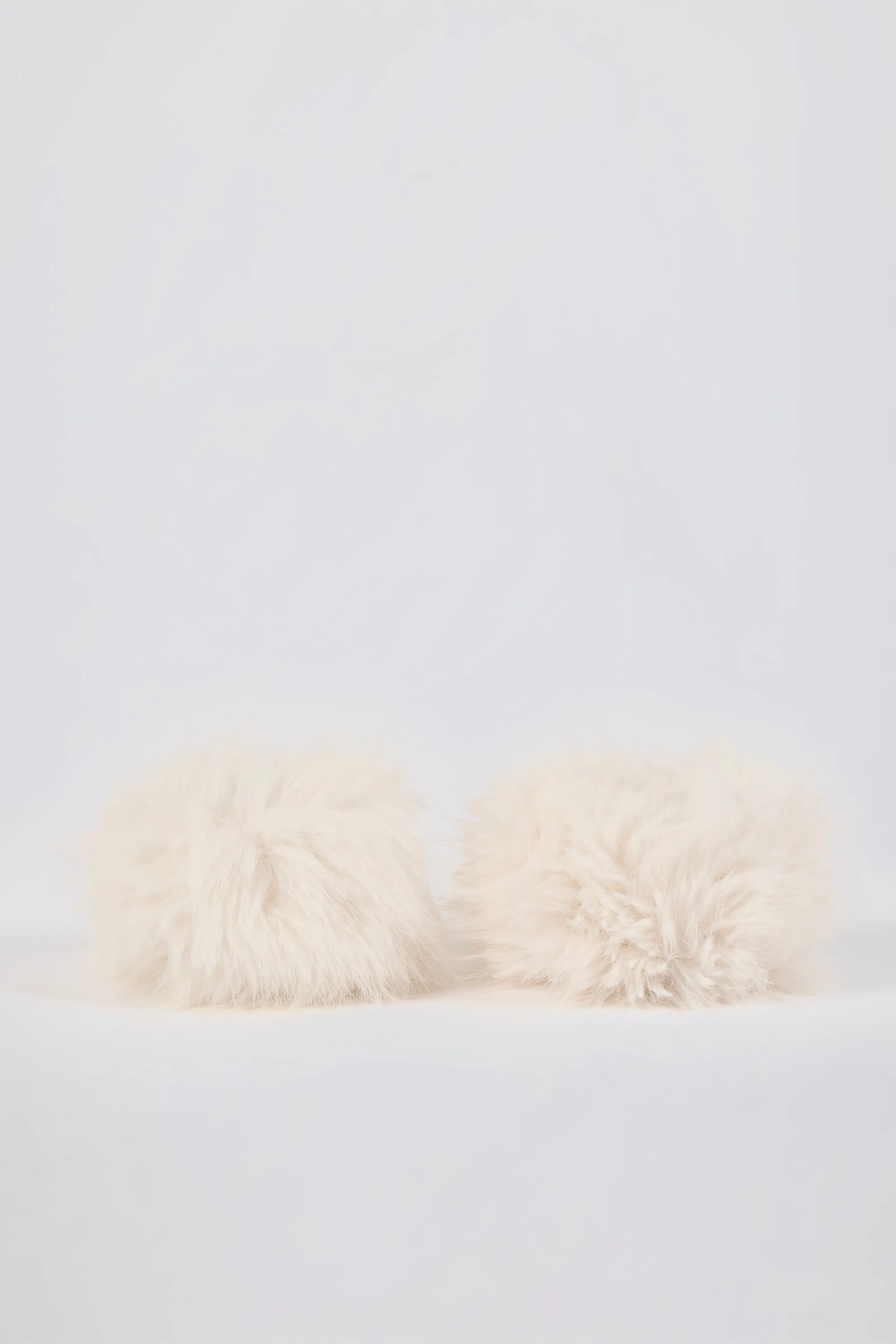 Faux-Fur Wrist Warmers in Ice White